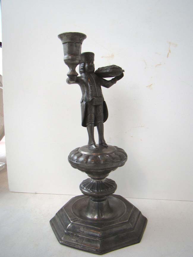 A nice pair of early 18th century Dutch pewter candlesticks depicting a Butcher and a Baker — image 3